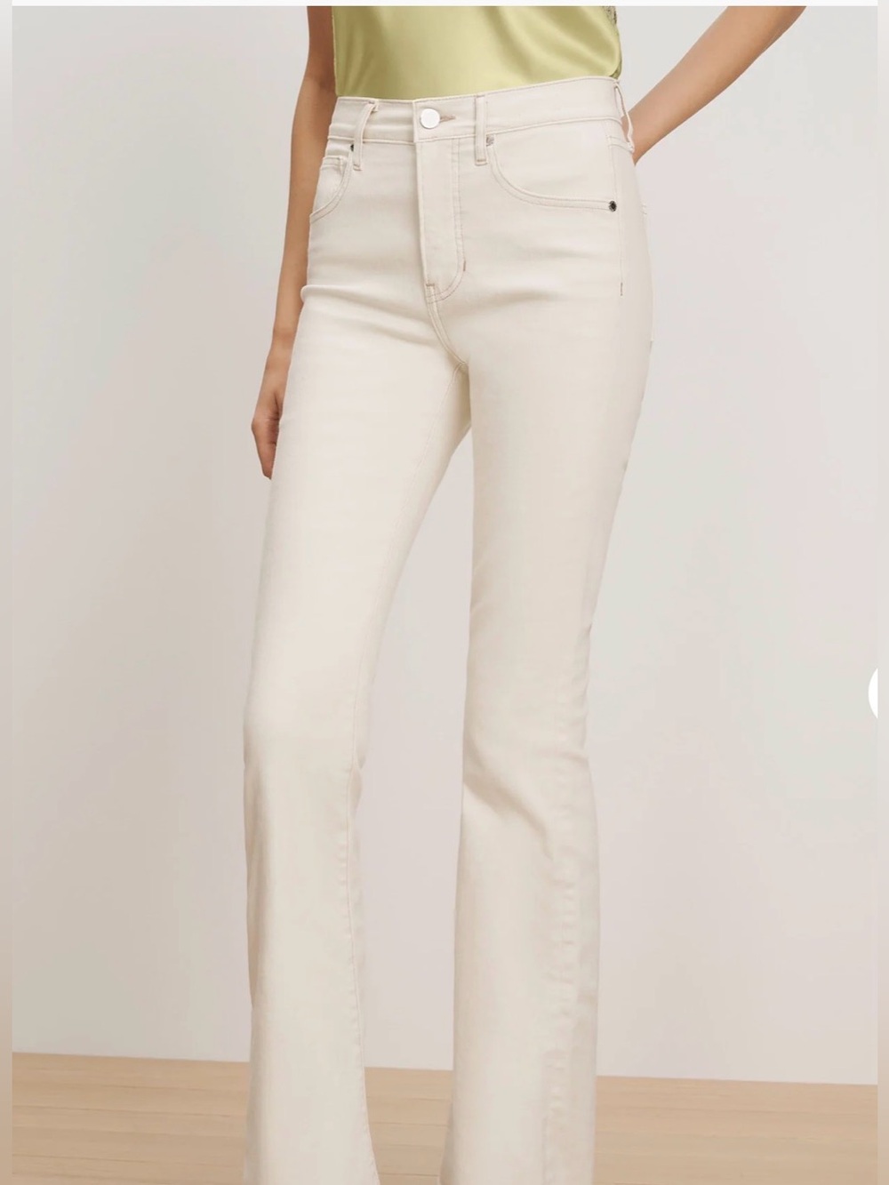 High-Rise Cream Flare Jeans its New